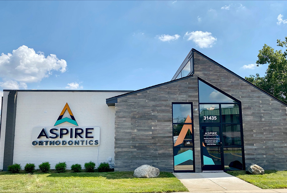 exterior office of Aspire Orthadontics with brand signage
