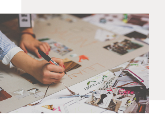 image of people working at a table during the digital marketing process